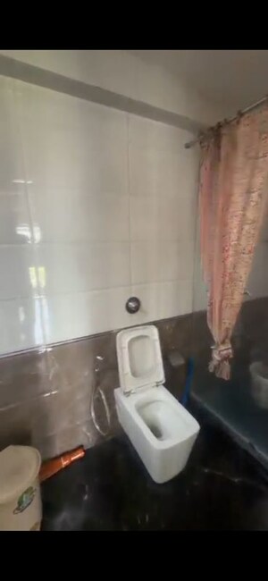 Bathroom in 3 BHK Apartment at DLH Sorrento, Veera Desai Road – for Rent