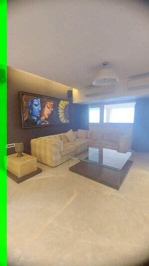 Living Room in 4 BHK Apartment at Palazzo Apartment, Santacruz West – for Sale