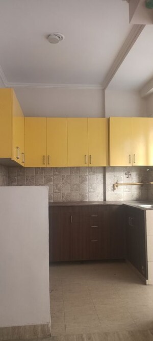 Kitchen in 2 BHK Apartment at Amrapali Kingswood, Sector 4 Greater Noida – for Sale