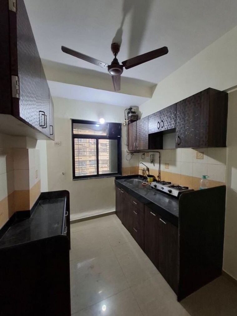 Kitchen, rna-ng-suncity-phase-ii 2 Bedroom 650 Sq.Ft. Apartment In Kandivali East Mumbai 9767471