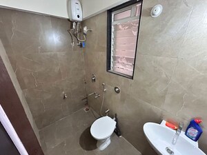 Bathroom in 1 BHK Apartment at Mahavir Kalpavruksha, Ghodbunder Road – for Sale