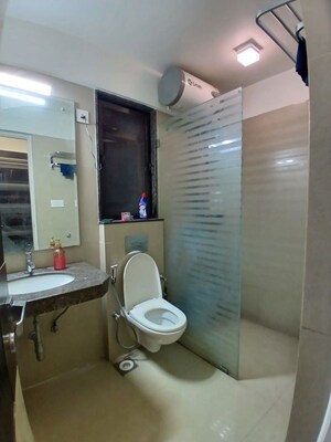 Bathroom in 2 BHK Apartment at Raheja Serenity, Kandivali East – for Rent