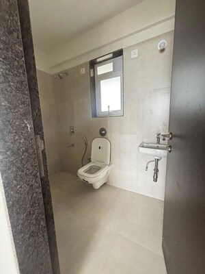 Bathroom in 2 BHK Apartment at Puranik City Reserva, Ghodbunder Road – for Rent