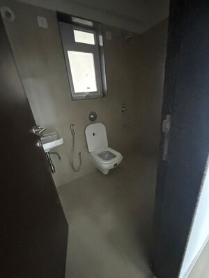 Bathroom in 2 BHK Apartment at Puranik City Reserva, Ghodbunder Road – for Rent