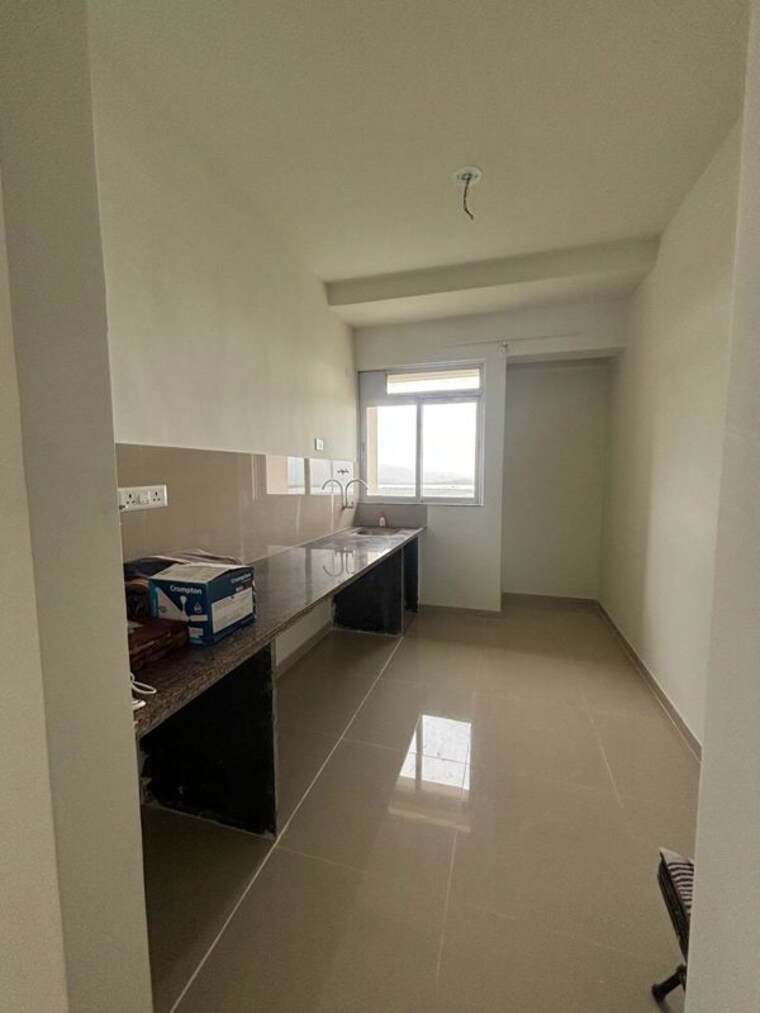 Kitchen, puranik-city-reserva 2 Bedroom 717 Sq.Ft. Apartment In Ghodbunder Road Thane 10723711