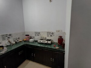 Kitchen in 1.5 BHK Builder Floor at Paarth Aryavart Empire, Aliganj – for Rent