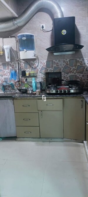 Kitchen in 3 BHK Apartment at Janakpuri – for Sale