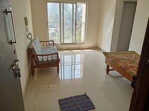 Living Room in 1 BHK Apartment at Sunrise Glory, Shilphata – for Rent
