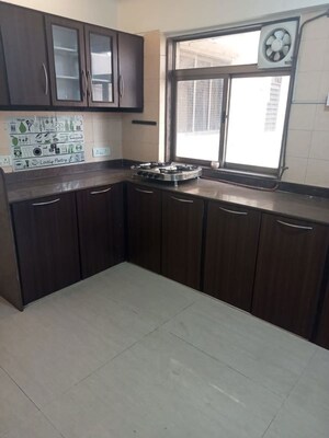 Kitchen in 2 BHK Apartment at Greenfield CHS, Santacruz West – for Sale