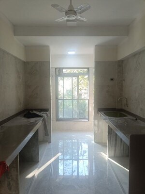Kitchen in 2 BHK Apartment at Paradigm Artteza, Santacruz West – for Sale