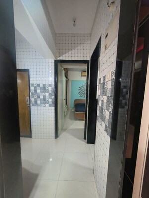 Building Lobby in 1 BHK Apartment at Adhiraj Gardens, Kharghar – for Rent