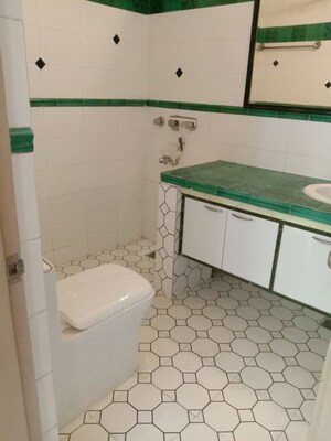 Bathroom in 3 BHK Builder Floor at Nehru Enclave – for Rent