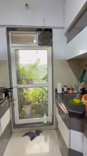 Kitchen in 1 BHK Apartment at JP North Elara, Mira Road – for Sale