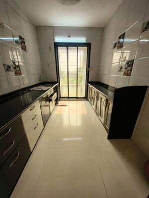 Kitchen in 2 BHK Apartment at Shree Ambika Heritage, Kharghar – for Rent