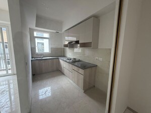Kitchen in 2.5 BHK Apartment at Smart World Orchard, Sector 61 – for Sale