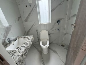 Bathroom in 2.5 BHK Apartment at Smart World Orchard, Sector 61 – for Sale