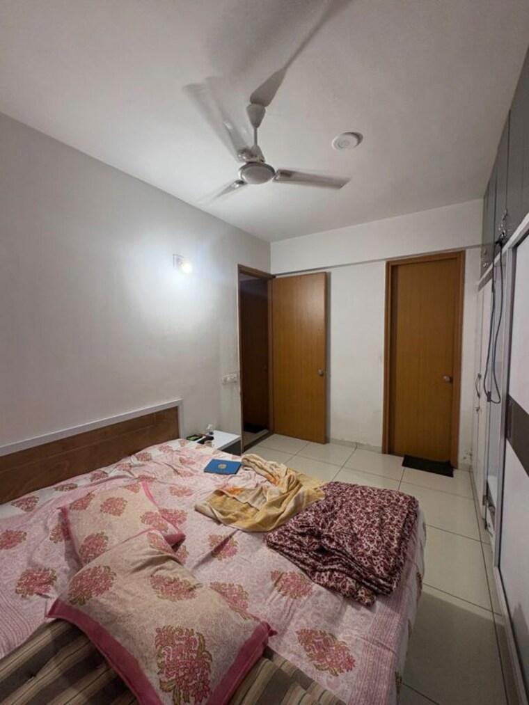 Bedroom, aaryan-aaviskaar 2 Bedroom 1230 Sq.Ft. Apartment In Shela Ahmedabad 10724079