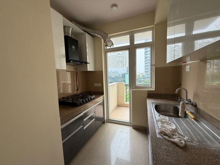 Kitchen, emaar-emerald-estate 2.5 Bedroom 1020 Sq.Ft. Apartment In Sector 65 Gurgaon 10724086