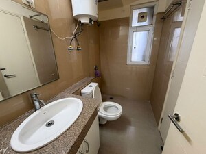 Bathroom in 2.5 BHK Apartment at Emaar Emerald Estate, Sector 65 – for Sale