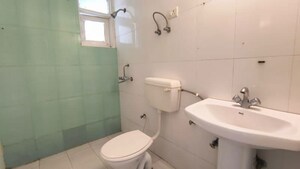 Bathroom in 3 BHK Apartment at Mittal Rajnagar Residency, Raj Nagar Extension – for Sale