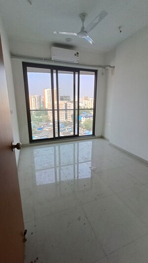Bedroom in 2 BHK Apartment at Naman Habitat, Andheri West – for Rent