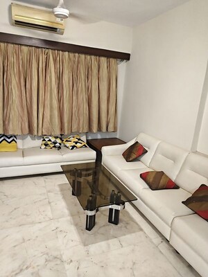 Living Room in 2 BHK Apartment at Juhu – for Rent