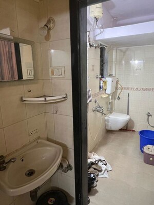 Bathroom in 1 BHK Apartment at Shree Vallabh Tower, Malad West – for Rent
