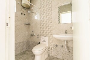Bathroom in 3 BHK Apartment at Sarovar Mansion, Banaswadi – for Sale