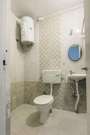 Bathroom in 3 BHK Apartment at Sarovar Mansion, Banaswadi – for Sale