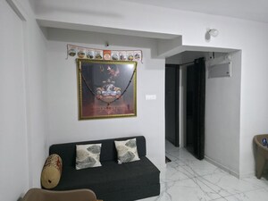 Living Room in 1 BHK Apartment at Metropolis Rivera, Kasarvadavali – for Sale