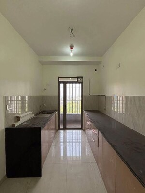 Kitchen in 2 BHK Apartment at Kalpataru Paramount, Kapur Bawdi – for Rent