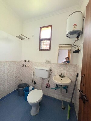Bathroom in 2.5 BHK Apartment at Amrapali Silicon City, Sector 76 – for Sale