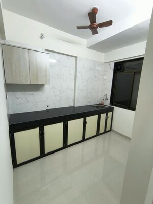 Kitchen in 3 BHK Apartment at Hill View CHS Haware City, Haware City – for Sale