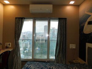Bedroom in 2 BHK Apartment at Newlook Bhavya Elite, Wadala – for Rent