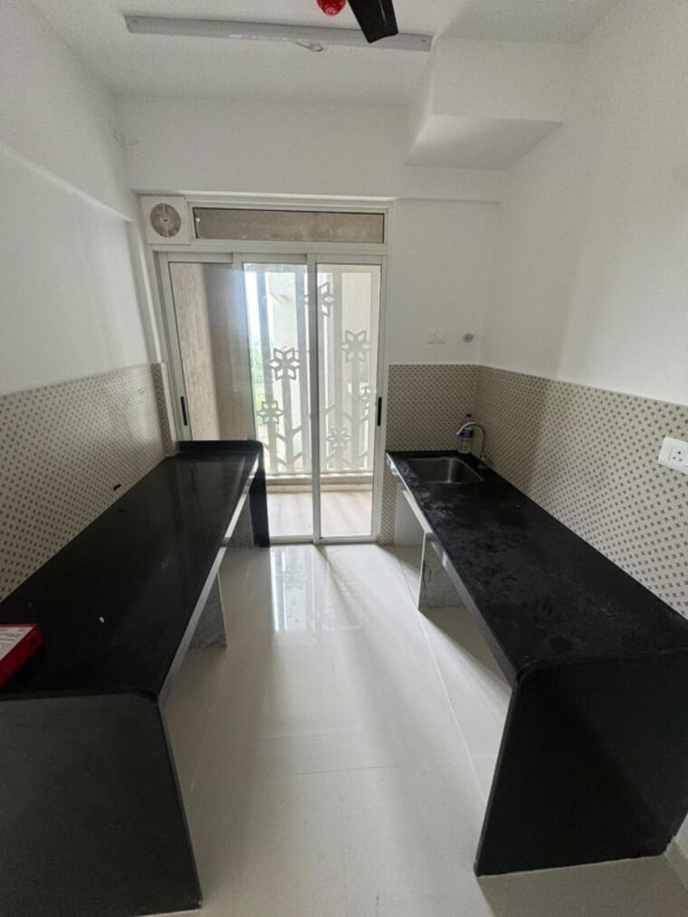 Kitchen, lodha-codename-premier 2.5 Bedroom 759 Sq.Ft. Apartment In Dombivli East Thane 10724561