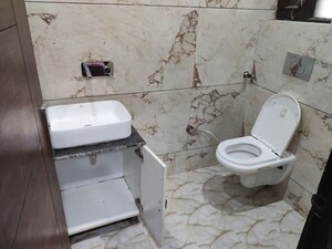 Bathroom in 3 BHK Builder Floor at Motia Blue Ridge, Dhakoli – for Rent