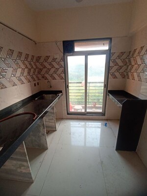 Kitchen in 1 RK Apartment at JVM Sky Court, Bhayandarpada – for Rent