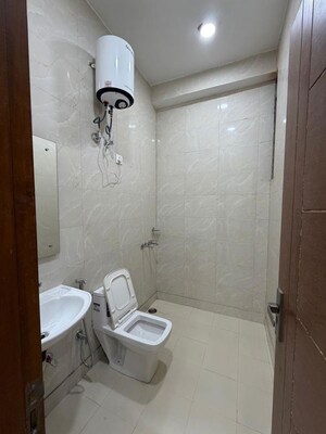 Bathroom in 3 BHK Builder Floor at Chittaranjan Park – for Sale