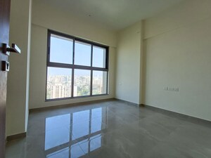Room in 2 BHK Apartment at Sheth Irene, Malad West – for Rent