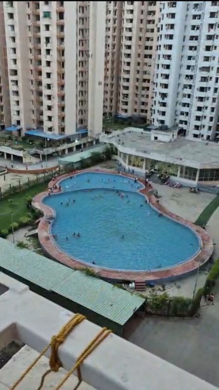 Swimming Pool, srs-royal-hills 2.5 Bedroom 1133 Sq.Ft. Apartment In Sector 87 Faridabad 10724652
