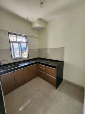 Kitchen in 2 BHK Apartment at Pride Larkins Nest, Ghodbunder Road – for Rent