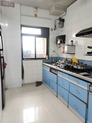 Kitchen in 2 BHK Apartment at Puraniks Kavya Dhara CHS, Dhokali – for Sale
