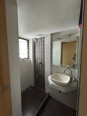 Bathroom in 2 BHK Apartment at Kanchan Pushp Society, Ghodbunder Road – for Rent
