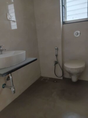 Bathroom in 2 BHK Apartment at Krishna Sudama Apartments, Aundh – for Rent