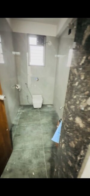 Bathroom in 3 BHK Apartment at Vinayak Eastern River Residency, Pimple Saudagar – for Rent