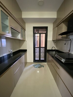 Kitchen in 2.5 BHK Apartment at Rustomjee Athena, Majiwada – for Rent