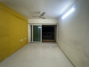 Room in 2 BHK Apartment at Rustomjee Urbania Azziano, Thane West – for Rent