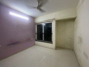 Room in 2 BHK Apartment at Rustomjee Urbania Azziano, Thane West – for Rent