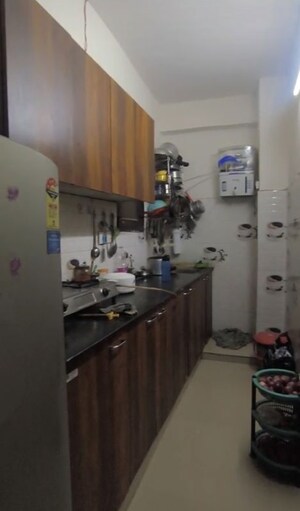 Kitchen in 2 BHK Apartment at Singhal Residency, Sector 73 – for Sale