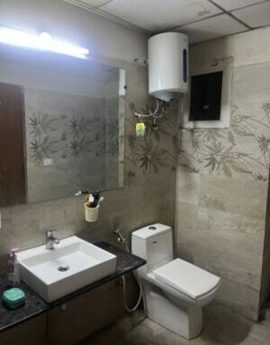 Bathroom in Studio Apartment at Paramount Golf Foreste Apartments, Zeta I Greater Noida – for Rent